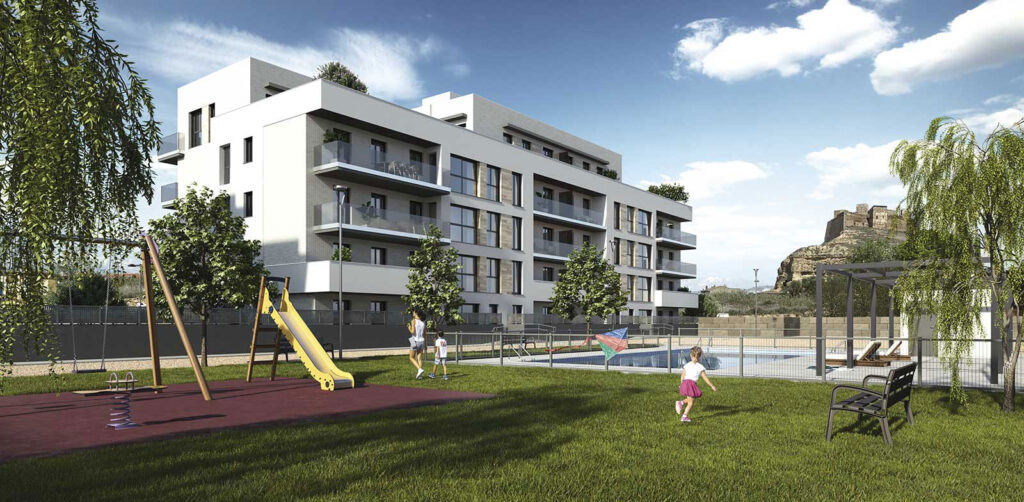 Zona verde y columpios con niños jugando en el edifiicio residencial la fuente monzón