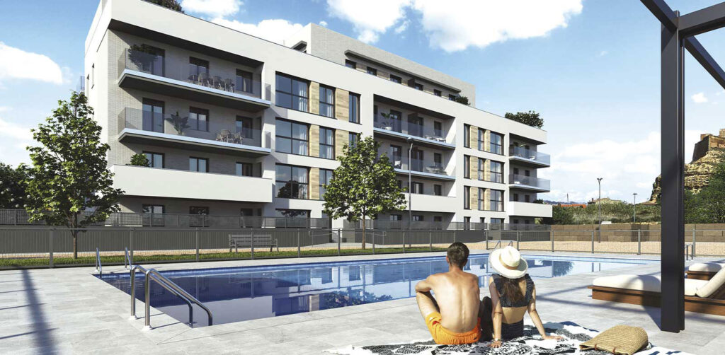 pareja tomando el sol en la piscina del edificio residencial la fuente de monzón